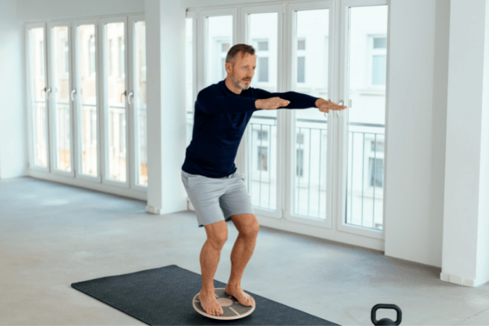 Man Balancing on Disk