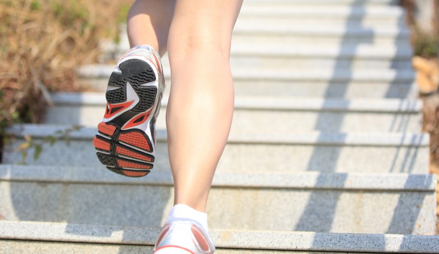 Woman Running Up Stairs