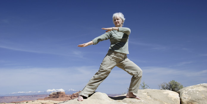 Eldery Womam Doing Tai Chi for Balance Training