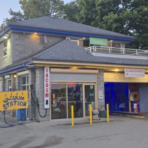 Lifemoves Human Performance Burnaby A two story building with a car wash on the first floor and Lifemoves Human Performance on the second floor.