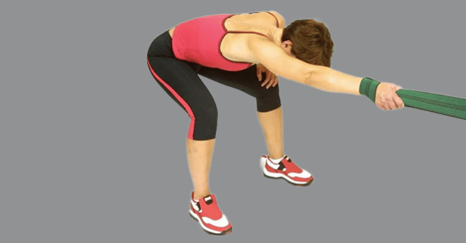 Lockeroom_Stretchband_Feature Caucasian person with brown hair, pink tank top, and black exercise tights. Bent over at the hips with one arm in front. They are holding a green Lockeroom stretchband to stretch their back, latissumus dorsi